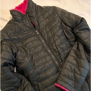 North face pink and black fluffy winter jacket